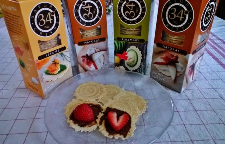 Nutella and a strawberry slice, on a 34 Degrees Sesame Crisp. 